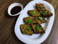 Marathi Recipes Kothimbir Vadi- कोथिंबीर वडी रेसिपी कोथिंबीर वडीसाठी साहित्य बारीक चिरलेली कोथिंबीर २ वाट्या ७-८ हिरव्या मिरच्या किंवा १...